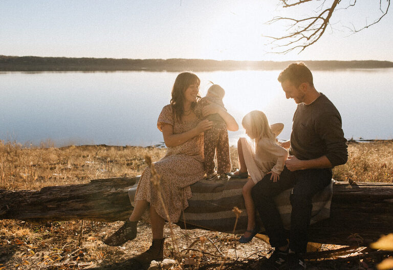 Family at golden hour by lake at Saylorville Lake family session by Des Moines Family Photographer Haverlee Photography