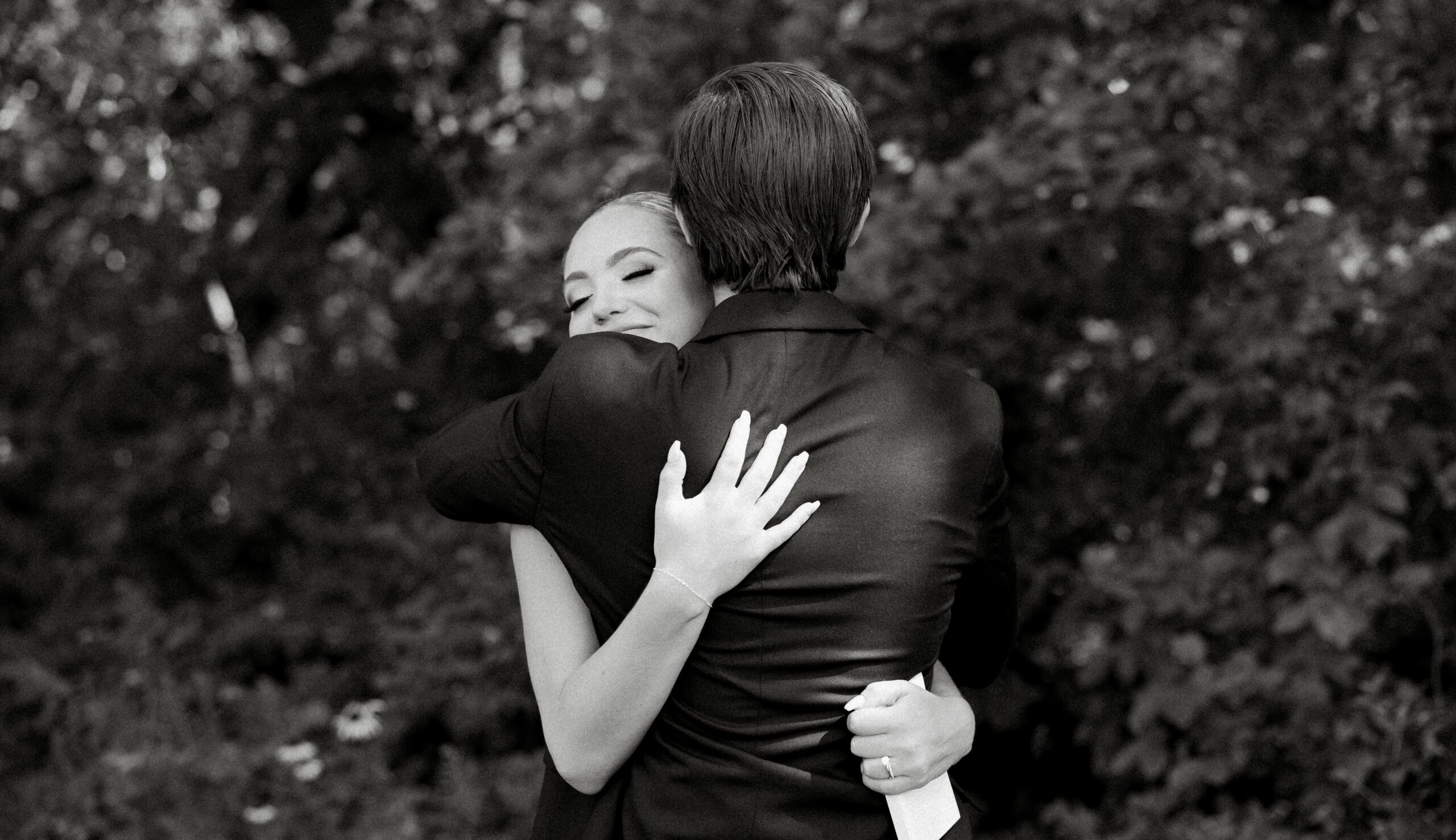 bride and groom hugging during first look in des moines
