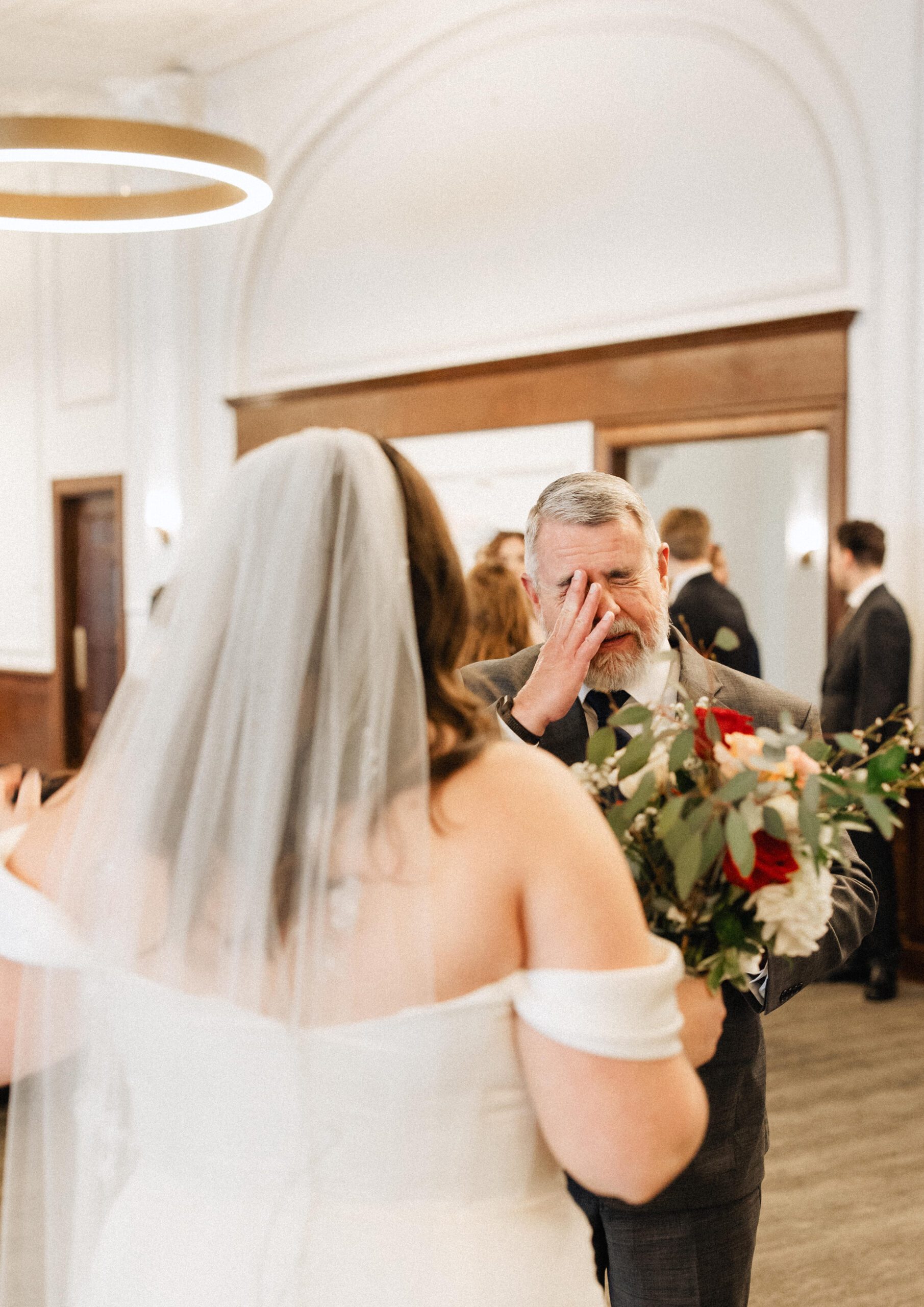 Father of the bride crying at Tearoom in Des Moines